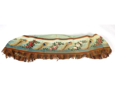 A 19th century Berlin hand wool worked floral and peacock feather designed border, with a deep fringe and cording along the t