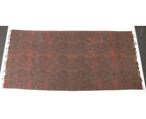 An 1860’s-70’s Scottish Paisley wool shawl, woven with multi coloured wools in a large scrolling teardrop design, bordered an