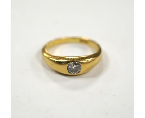 An 18ct and gypsy set solitaire diamond ring, size N/O, gross weight 6.1 grams, the stone diameter approx. 5.3mm by 5.1mm, wi