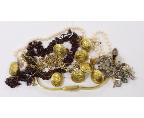 A single strand garnet pebble necklace, with barrel clasp, 38cm, eight military buttons, a lady's steel and gold plated Rotar