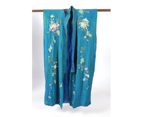 An early 20th century silk crêpe Japanese kimono and fringed tie belt, the back panel heavily embroidered with trailing chrys