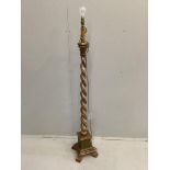 An 18th century style carved parcel-gilt barley twist standard lamp, height 140cm***CONDITION