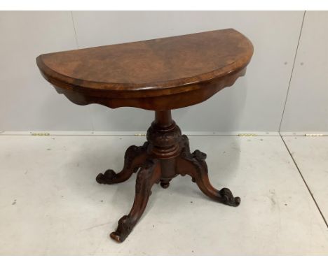 A Victorian figured walnut D shaped folding card table, width 90cm, depth 49cm, height 69cm***CONDITION REPORT***PLEASE NOTE: