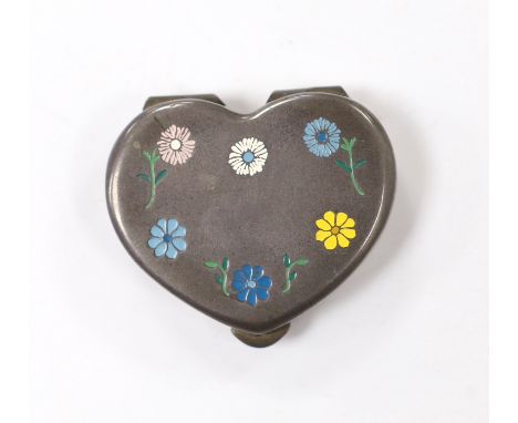 A 20th century Cartier sterling and enamel heart shaped pill box, decorated with flower heads, width 41mm.***CONDITION REPORT