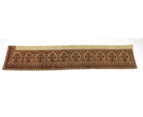 An early 19th century long Greek Islands cross stitch pelmet (hanging), embroidered on coarse linen with brown silk, using cr