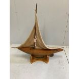 An early 20th century pond yacht on later stand, length 108cm, height including stand 112cm***