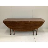 A reproduction 18th century style oak drop leaf wake table, length 194cm, width 150cm extended,