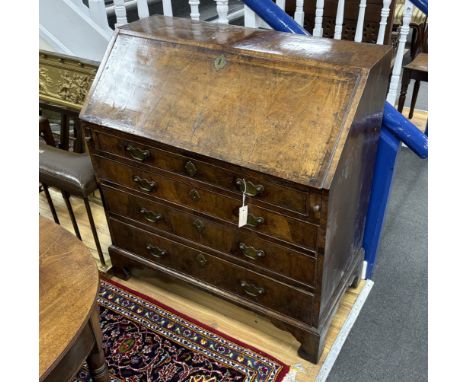 A 18th century walnut bureau, width 97cm, depth 50cm, height 104cm***CONDITION REPORT***Top has a new veneer patch. Fall fron