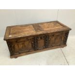 An 18th century style panelled pine coffer, width 146cm, depth 63cm, height 54cm***CONDITION