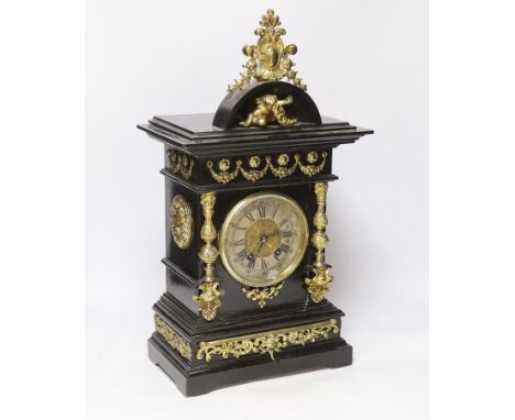 An ebonised German bracket clock with brass decoration, with a Lenzkirch movement striking on a coiled gong, 53cm high, with 