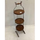 An oak and steel folding cake stand, height 92cm***CONDITION REPORT***PLEASE NOTE:- Prospective