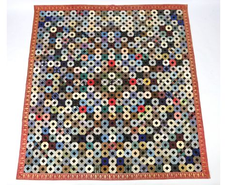 A handsome 19th century silk patch worked quilt, worked in repeating octagon shapes, in a large selection of 19th century pri