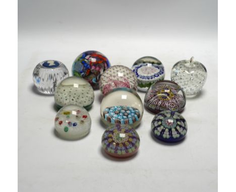 Eleven mixed Scottish and other glass paperweights including Caithness, largest 8.5cm in diameter***CONDITION REPORT***Genera