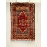 An antique hand knotted Caucasian blue ground prayer rug, 180 x 117cm***CONDITION REPORT***PLEASE