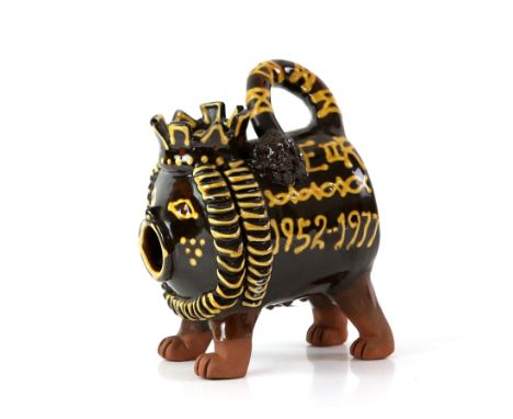 Mary Wondrausch slip decorated pottery lion, 'The Silver Jubilee' to one side and 'E II R 1952-1977' to the other, MW monogra