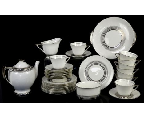 Royal Doulton Art Deco part tea service, with silver bands on a white ground, angular handles, pattern H4244, Rd. No 776716, 