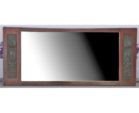 Art Nouveau rectangular mahogany wall mirror, the central bevelled mirror flanked by metalwork panels depicting stylised popp