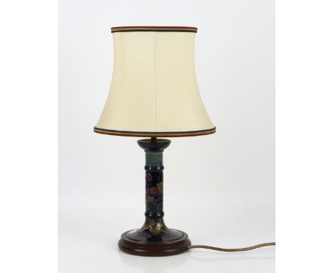 Moorcroft Finches pattern table lamp of column form, with tube lined decoration of bird and fruit on a cobalt ground, h30cm, 