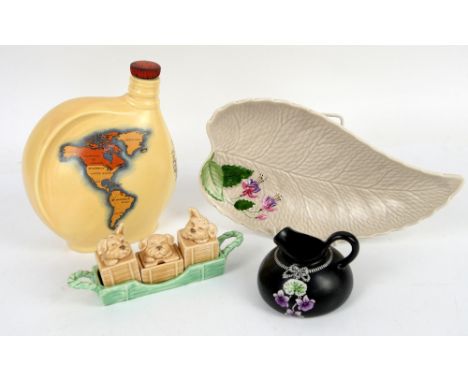 Sylvac dog cruet, 18.5cm wide, small Shelley jug, 8cm, Crown Devon leaf dish, 29cm, and Crown Ducal Australian Wine flask to 