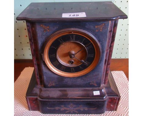 An Edwardian slate mantle clock.
