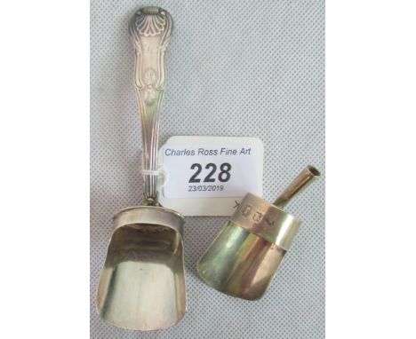 A 19th century silver caddy spoon, London 1818, together with another caddy spoon.