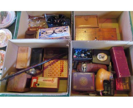 Four boxes of miscellaneous items, to include: set of postal scales, driving goggles, various pipes, marbles and other relate