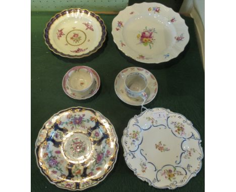 An 18th century Worcester plate with floral decoration within and blue and gilt border, together with a Liverpool cup &amp; s