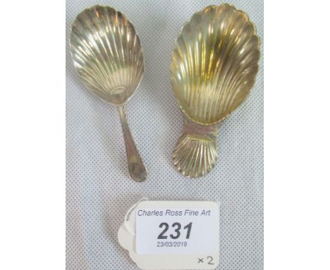 A 19th century silver caddy spoon, London 1825, together with another caddy spoon, unmarked.