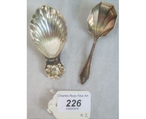 A cast silver caddy spoon Sheffield 1938, together with another Sheffield caddy spoon 1923.