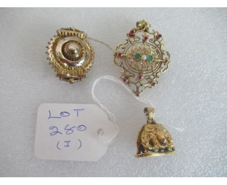 A double sided rams head seal, one mask with ruby eyes, a partially gem-set open scroll-work brooch/pendant and a late Victor
