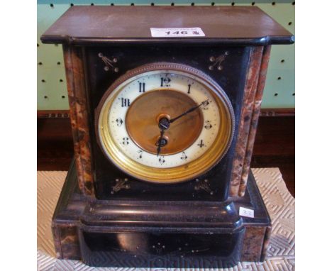 An Edwardian black slate mantle clock.