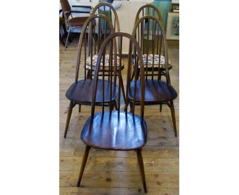 A set of five ercol dining chairs.