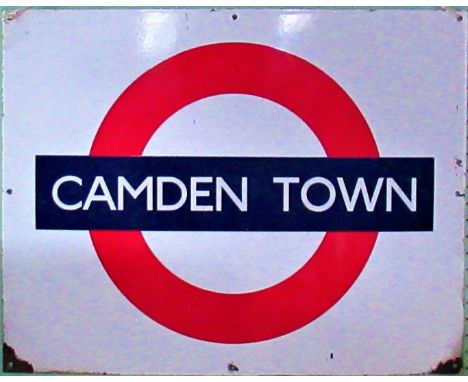 A 20th century enamel roundel underground railway sign depicting Camden Town.