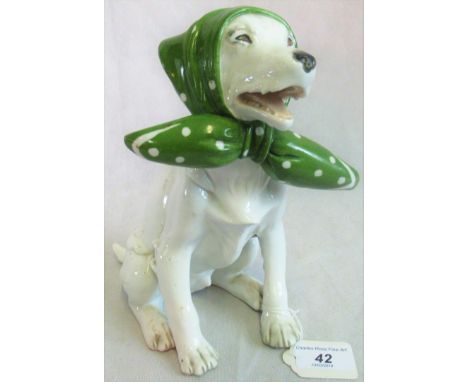 A mid-20th century German porcelain model of a labrador wearing a lady's scarf.