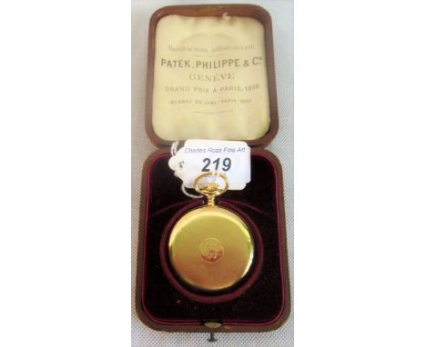 Patek Philippe.  An 18ct hunter top wind watch, the face bearing Arabic numerals with second hand dial at 6 o'clock, the inne
