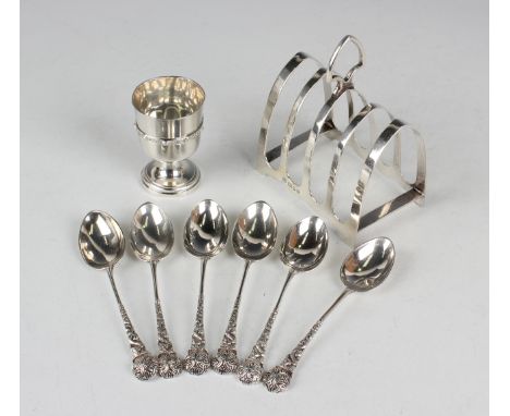 A set of six Edwardian Scottish silver teaspoons, each with cast Celtic style stem and finial, Glasgow 1910 by Lawson &amp; C