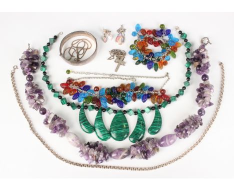 A group of mostly silver jewellery, including an oval hinged bangle with engraved decoration, London 1960, inside width 5.8cm