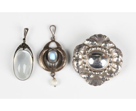 An Art Nouveau silver, moonstone and pearl pendant in a scrolling foliate design, unmarked, weight 3.5g, length 4.8cm, a Geor