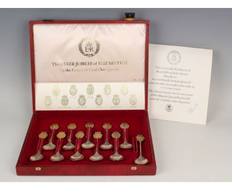 A set of eleven Elizabeth II Library of Imperial History silver and parcel gilt Silver Jubilee commemorative spoons, limited 