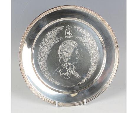 An Elizabeth II silver limited edition plate, designed by Pietro Annigoni, commemorating the Silver Jubilee with engraved bus