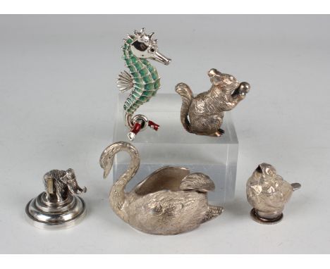 An Egyptian silver bowl in the form of a swan, height 5.4cm, an Egyptian silver bird salt caster, height 3.7cm, and an Egypti