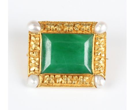 A gold, jade and half-pearl rectangular brooch, the rectangular jade mounted to the centre within a gold surround, decorated 