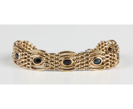 A 9ct gold and sapphire bracelet in a curved bar and oval gate link design, on a sprung hook shaped clasp, weight 30.2g, leng