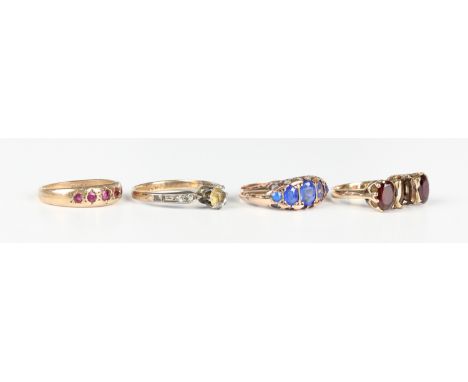 A 9ct gold and blue doublet five stone ring, Chester 1913, ring size approx O, a 9ct gold and red gem set five stone ring, a 