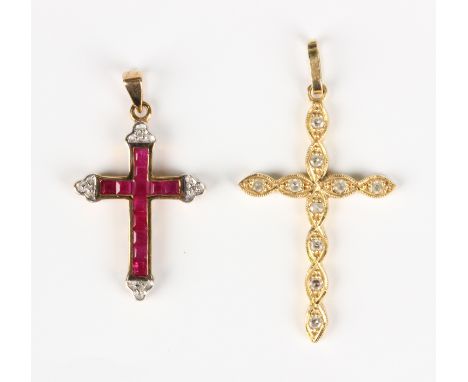 A 9ct gold, ruby and diamond pendant cross, weight 1.7g, length 3cm, and a gold and diamond pendant cross, detailed '18ct', w