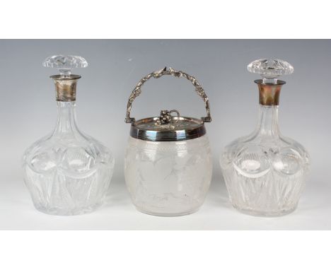 A Victorian plated and glass biscuit barrel, the clear glass body acid etched with fruiting vines, height 22cm, together with