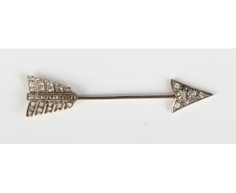 A gold, platinum and diamond jabot pin, early 20th century, designed as an arrow, mounted with cushion and rose cut diamonds,