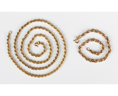 A 9ct gold ropetwist link neckchain on a boltring clasp, length 57cm, and a matching 9ct gold bracelet, length 19cm, total we