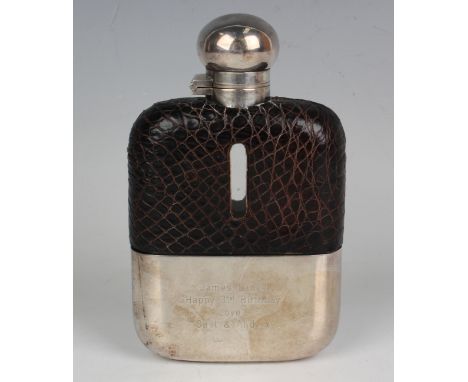 A George VI silver mounted crocodile skin covered glass hip flask with hinged screw lid and detachable cup, Sheffield 1938 by