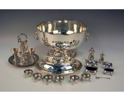A collection of assorted plated items, including a punch bowl, two muffin dishes and covers and a three-piece tea set.Buyer’s
